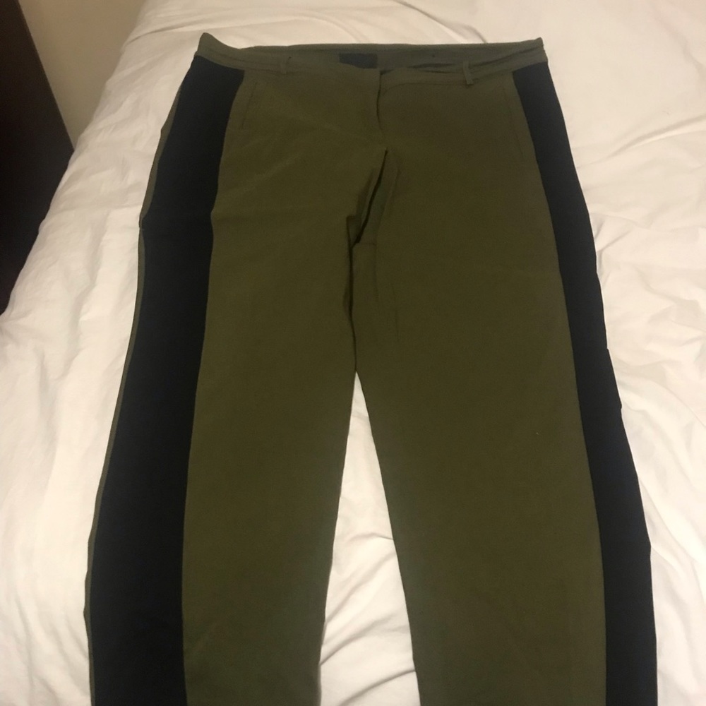 Green and black crop length trousers